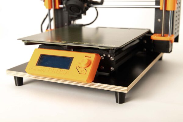 3D printer stands on anti-vibration damper board with flexible damper feet and additional vibration-damping weights