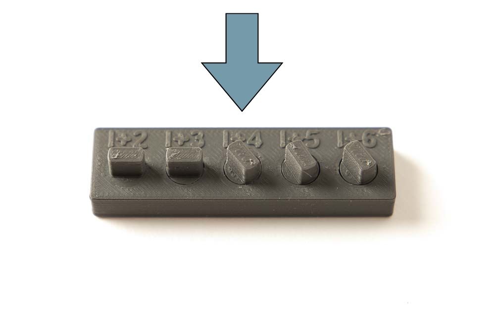 3D printed benchmark tester after the turning test of the individual inserts, optimal gap for print in place or part in part technology was determined at a gap of 0.4 mm