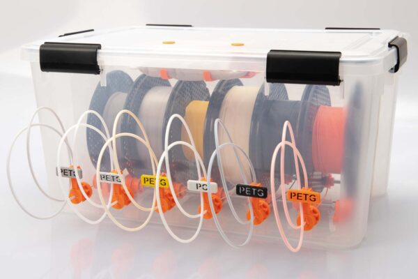 Filament storage box with six filament outlets variant B and attachable signs to identify the stored filament spools.