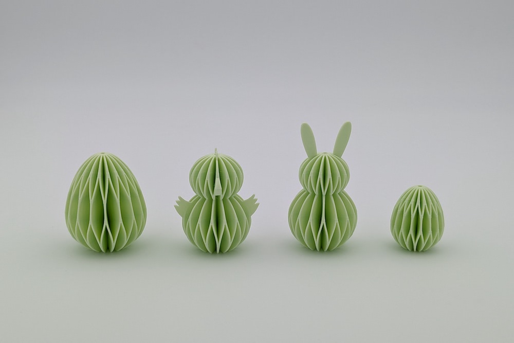 3D printed set of Easter ornaments in a honeycomb design (large egg, chick, bunny, small egg) in light green