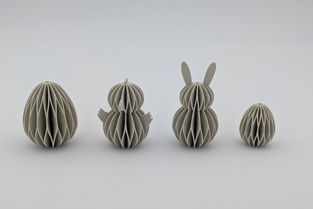 3D printed set of Easter ornaments in honeycomb design (large egg, chick, bunny, small egg) in the color beige
