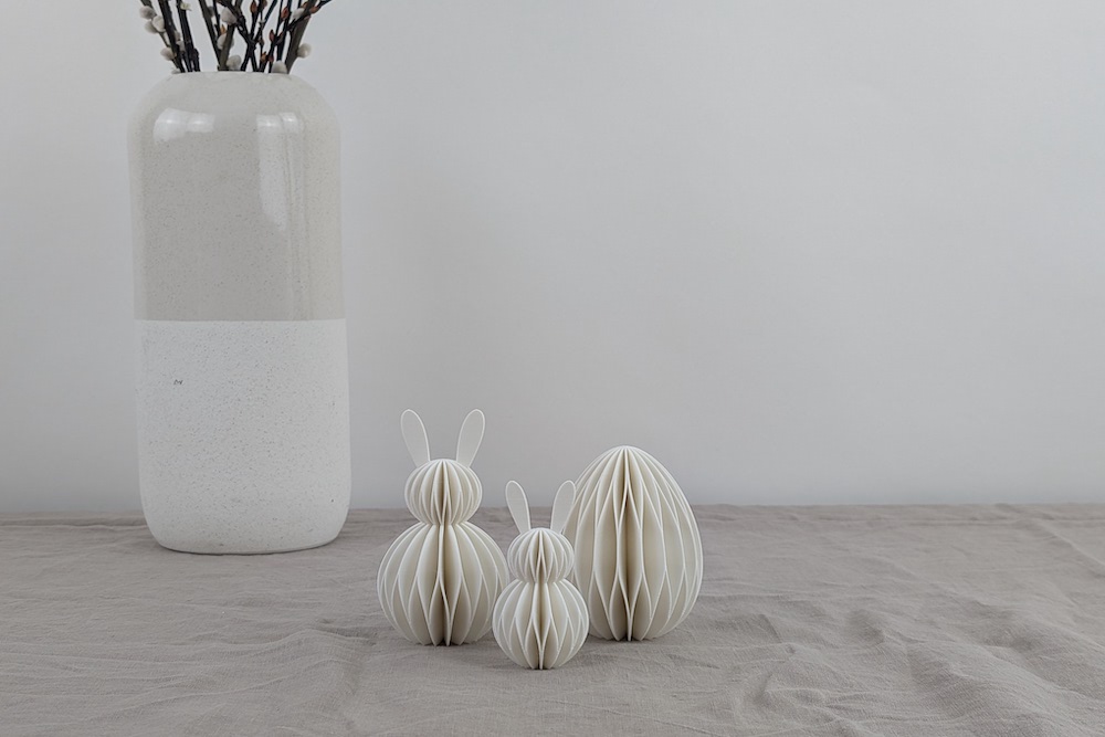 White honeycomb-style Easter decoration set (including two bunnies in different sizes and one Easter egg)