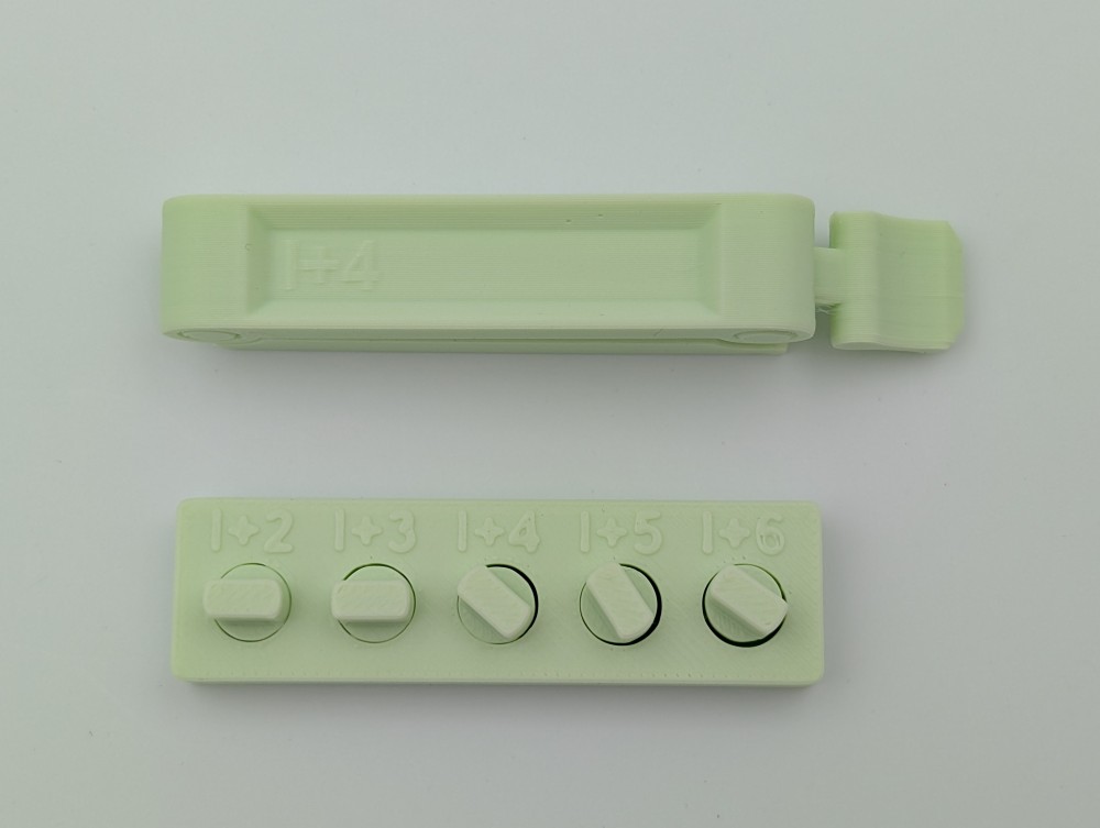 3D print locking clip and joint tester - The print-in-place joint can be printed with different gaps - the printed tester shows which gaps fit the 3D print setup.